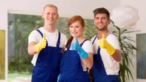 Cleaners holding cleaning equipment