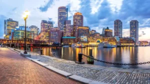 Boston Ma business skyline from the river during the day