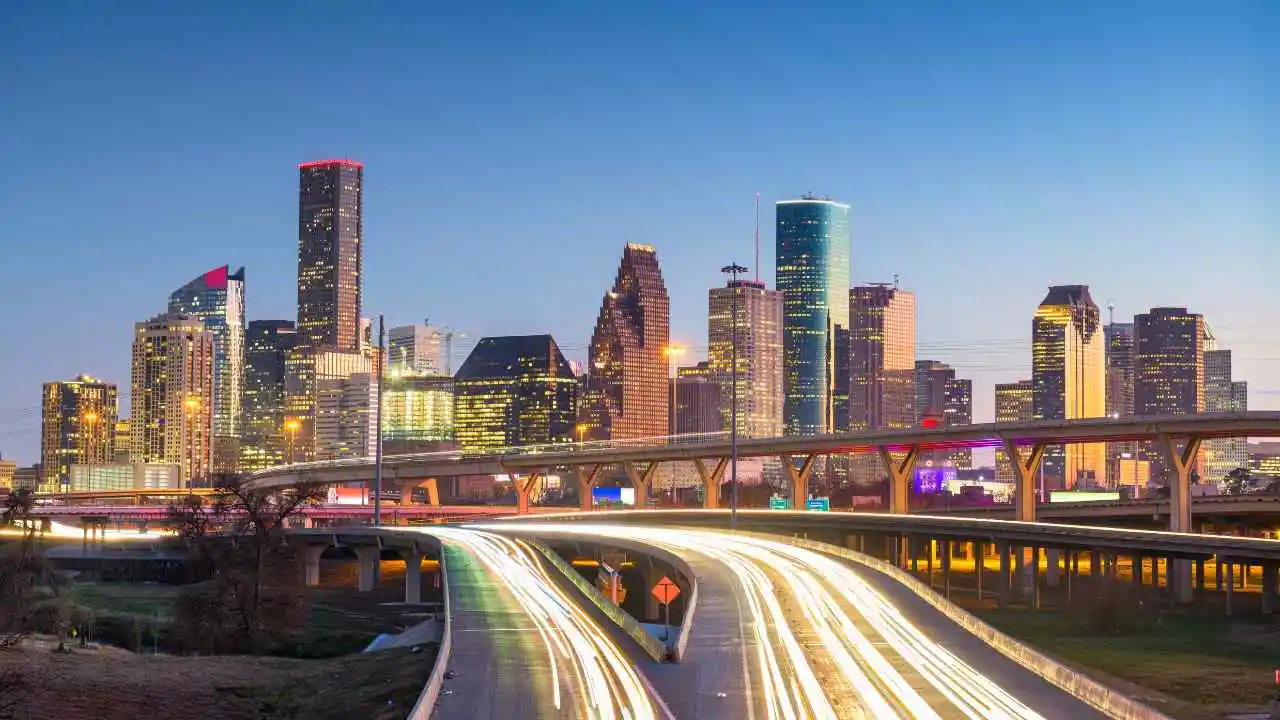 Houston TX skyline at dusk with highway view
