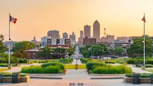 Des Moines, IA during sunset and view of skyline and city hall